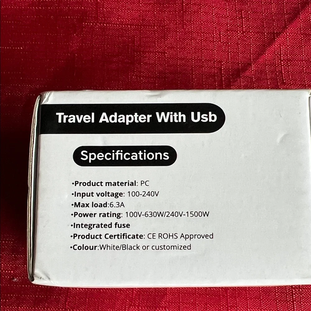 Ravel Universal Travel Adapter - Black and Orange